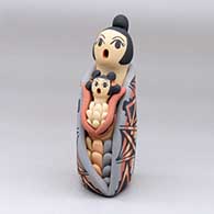 A polychrome singing Corn Maiden with one child
 by Chrislyn Fragua of Jemez