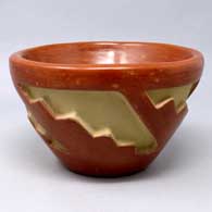 A bowl decorated with a geometric design