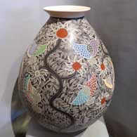 Sgraffito and painted hummingbird, branch and flower design on a large polychrome jar