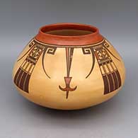 A polychrome jar decorated with a four-panel bird element, geometric design and fire clouds