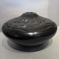 Black carved jar