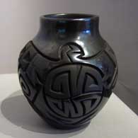 Carved black jar