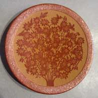 A plate with a sgraffito design
