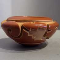 Carved red jar by Effie Garcia
