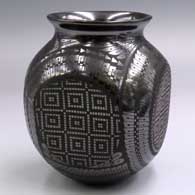 Black-on-black jar with a squarish body and 4-panel geometric design