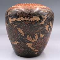 Black jar with a sienna rim and sgraffito and painted hummingbird, flower, branch and geometric design
