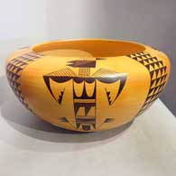 Polychrome bowl with four direction katsina, bird element and geometric design