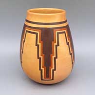 A polychrome jar with a six-panel moth and Awatovi geometric design above the shoulder