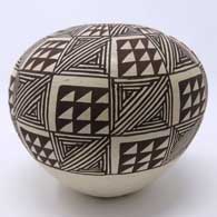 Fine line and slanted mesa design on a black and white seed pot