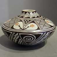 Awatovi spiral, lightning, medium sherd and geometric design on a polychrome seed jar