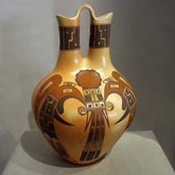 Bird elements and geometric design on a polychrome wedding vase