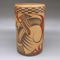 A polychrome cylinder decorated with bird element and geometric designs