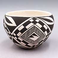 Black-on-white bowl with a checkerboard, fine line, medallion and geometric design