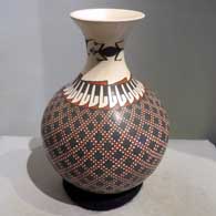 Polychrome jar with lizard and geometric design