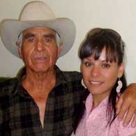 Juan Quezada Sr and Laura Bugarini pose together