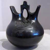 A black on black wedding vase with a geometric design, created by Linda Askan
