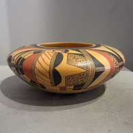 Four direction sherd, cactus, bird element and geometric design on a yellow jar