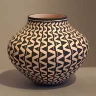 Geometric design on a black and white jar