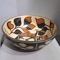 Polychrome bowl with bird, plant and geometric design