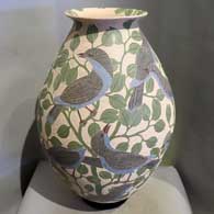 Pot with bird, branch and geometric design