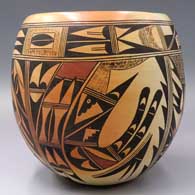 A polychrome jar decorated with a bird element and geometric design