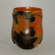 Brown jar with fire clouds