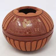 A Potsuwii-style jar with a sgraffito and painted design and some micaceous clay slip