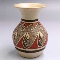 A polychrome jar with a flared opening and a migration pattern design
