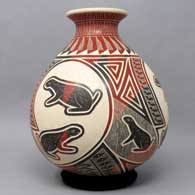 Polychrome jar with sgraffito and slipped prairie dog and geometric design, click or tap to see a larger version