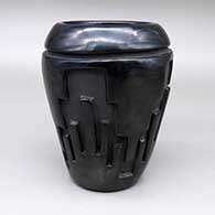 Black jar with a four-panel carved kiva step geometric design
 by Frances Chavarria of Santa Clara