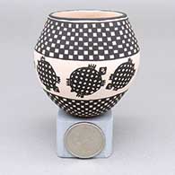 Small polychrome jar with a turtle and checkerboard geometric design
 by Unknown of Acoma
