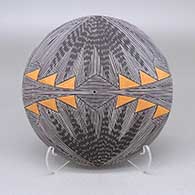Polychrome seed pot with a fine line and geometric design
 by Rebecca Lucario of Acoma