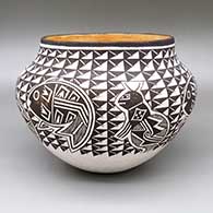 Polychrome jar with a painted Mimbres ant, fish, and geometric design
 by Grace Chino of Acoma