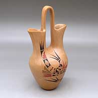 Click for a larger view A polychrome wedding vase decorated with a two-panel bird element and geometric design
 by Gloria Kahe of Hopi