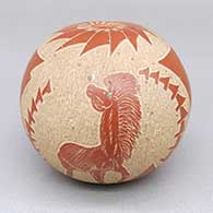 Red seed pot with a sgraffito horse, plant, feather ring, and geometric design, and an inlaid turquoise stone detail
 by Roy Tanner of Santa Clara