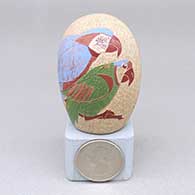 Miniature polychrome seed pot with a sgraffito and painted parrot, owl, and branch design
 by Camilio Tafoya of Santa Clara