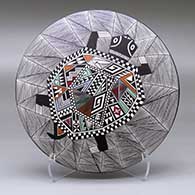 A polychrome seed pot with a turtle, fine line and geometric design
 by Sharon Lewis of Acoma