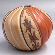 Polychrome seed pot carved with a 10-rib melon design and painted with 4 mature corn stalks
 by Virginia Ponca Fragua of Jemez