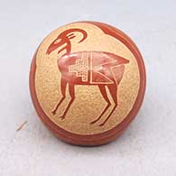 Miniature brown seed pot with sgraffito Mimbres pronghorn antelope and geometric design, Includes stand with nameplate and glass coveringH28
 by Joseph Lonewolf of Santa Clara