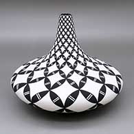 Black-on-white jar with a geometric design
 by Dorothy Torivio of Acoma