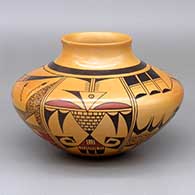 A polychrome jar decorated with a four-panel tadpole, bird element and geometric design
 by Mark Tahbo of Hopi