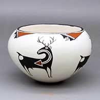 A polychrome bowl decorated with a four-panel deer-with-heart-line and geometric design
 by Emma Lewis of Acoma