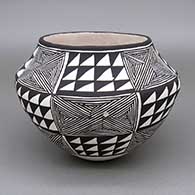 Black and white jar with a fine line and geometric design
 by Lucy Lewis of Acoma