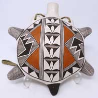 Polychrome turtle canteen with fine line and geometric design
 by Rose Chino Garcia of Acoma