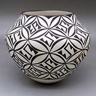 A black-on-white jar with a geometric design
 by Jessie Garcia of Acoma