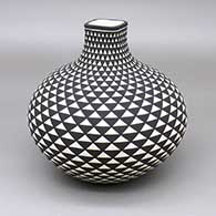 Black-on-white jar with a square opening and a geometric design
 by Paula Estevan of Acoma