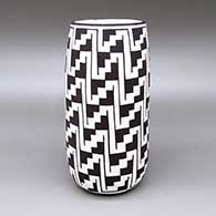 Black-on-white cylinder with a kiva step geometric design
 by Carmel Lewis of Acoma