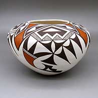 Polychrome jar with a four-panel geometric design
 by Virginia Lowden of Acoma