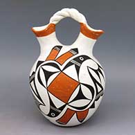 Polychrome wedding vase with braided handle and geometric design
 by Eva Histia of Acoma