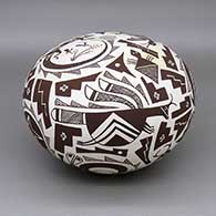Polychrome seed pot with a Mimbres lizard, quail, fish, rabbit, deer, bird, insect, flower, and geometric design
 by Barbara Cerno of Acoma